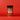 A bottle of Chili Crisp SaladSprinkles on a red background
