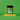 A bottle of Classic Herb SaladSprinkles nestled in a little pile of salad sprinkles on a green background.